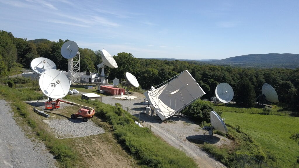 DCIM\100MEDIA\DJI_0051.JPG In addition to its array of medium and large-aperture antennas serving GEO, MEO and LEO satellites, the VVT site provides up to 36,000 s/f of colocation space in two buildings and open land for additional antennas. These secure facilities are hardened by a 12 kV utility power service, six diesel generators and five UPS systems – all within a perimeter security fence with controlled access and monitored with CCTV video surveillance.